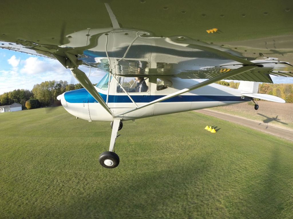 Cessna 140 (N2305V) - Fall flying at Wilderness Airport in Michigan.  Nice shadow and wing reflection.  GoPro camera