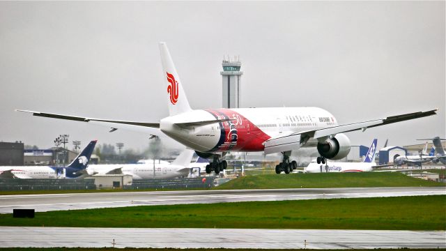 BOEING 777-300 (B-2047) - BOE169 from KARA on final to Rwy 16R on 4/19/14. The aircraft was returning after being painted. (LN:1196 / cn 60374).