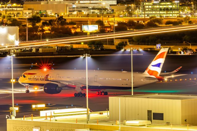 Airbus A350-1000 — - British Airways A350-1000 taxiing at PHX on 9/22/22, while a landing Southwest 737 whizzes by and becomes a streak. Taken with as Canon 850D and Canon EF 70-200mm f/2.8L IS II USM.