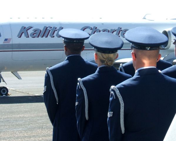 AMERICAN AIRCRAFT Falcon XP (N227CK) - Team Kirtland Honor Guardsmen waiting as the plane taxis in to park prior to Dignified Transfer Ceremony at Santa Fe, NM.  The fallen warrior was a USAF Staff Sergeant.