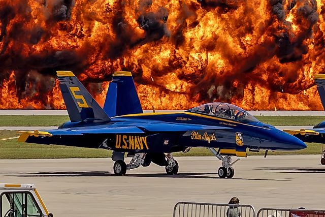McDonnell Douglas FA-18 Hornet (16-5805) - The Blue Angels #5, lead solo jet, in front of the “wall of fire during the MAGTF demo at the MCAS Beaufort Airshow rehearsal, Friday, 11 Apr 2025. 