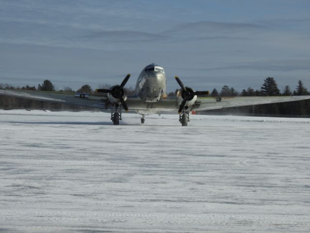 — — - DC-3 in for paint at cyqa