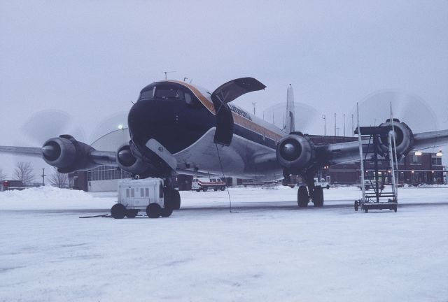 N93459 — - Engine run-up on a cold, snowy evening.