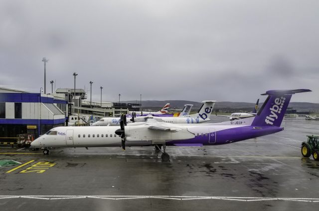 G-JECP — - In the last days of pre-2020 end of services, Flybe with a handful of Q400s sitting at the gate in Belfast...maybe they'll come back in 2022?