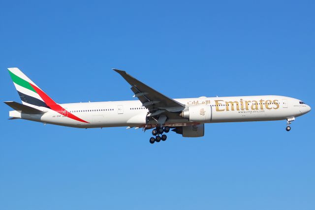 BOEING 777-300ER (A6-ENF) - An Emirates B777-300ER landing at Frankfurt Airport.br /br /Location: Viewpoint "West Runway"/Aussichtspunkt "Startbahn West".br /Date: 13.02.23 (dd/mm/yy