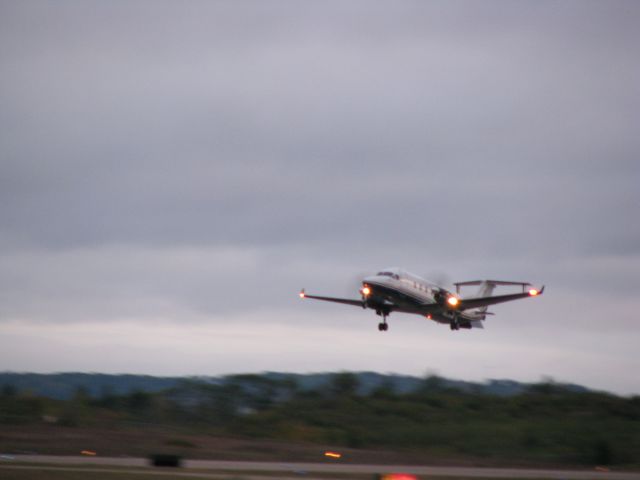 Beechcraft 1900 (N535M) - Menards early morning take off