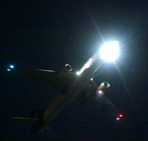 BOEING 767-300 — - Witching hour (midnight) photo. A bright Moon 2 days before full when I took this image. When conditions are right the planes glide path is right over my house for runway 35R. Not the best of photos as I had to use a high ISO to capture the body of the aircraft. The plane is normally about 2100 feet above me and the landing lights can actually cast shadows of my trees on the ground. 