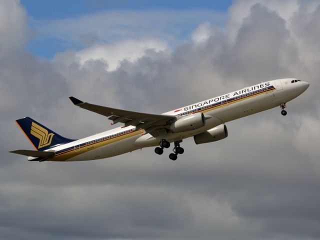 Airbus A330-300 (9V-STK) - Getting airborne off runway 23 and heading home to Singapore. Saturday, 24th March 2012.