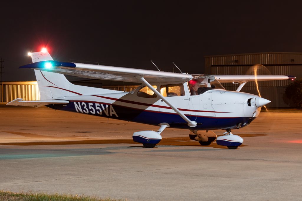 Cessna Skyhawk (N355VA) - Victory Aviation Club's 1976 Cessna 172 doing preflight on the ramp at Butler County Regional.