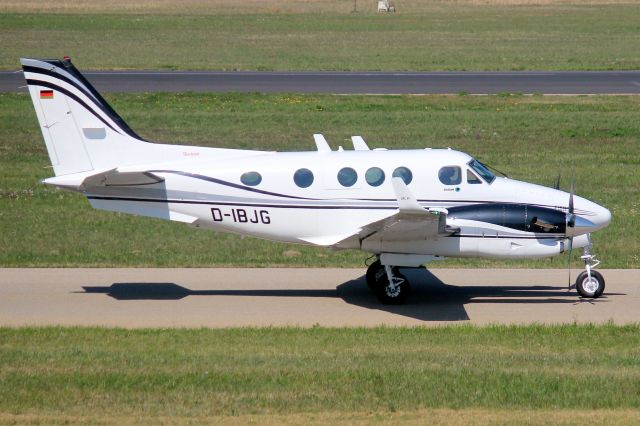 Beechcraft King Air 90 (D-IBJG) - Taxiing to depart rwy 24 on 11-Apr-25 heading for EDDS.