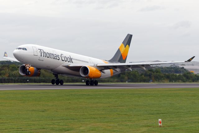 Airbus A330-200 (G-MDBD) - TCX166 with a 10hr flight to Las Vegas ahead has the stbd mgl off the ground in anticipation of the cross-wind from the port side