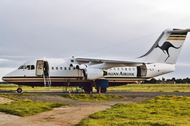 VH-NJY — - AUSTRALIAN AIRLINK - BRITISH AEROSPACE BAe-146-100 - REG : VH-NJY (CN E1005) - ADELAIDE INTERNATIONAL AIRPORT SA. AUSTRALIA - YPAD 29/7/1992