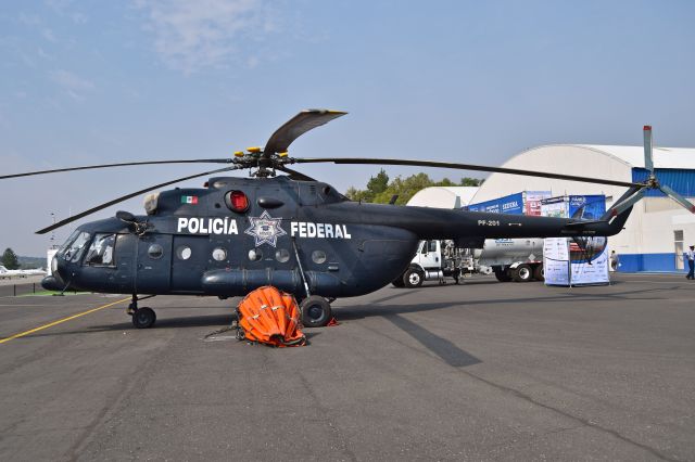 MYASISHCHEV Stratosfera (SIF201) - Former Federal Police helicopter Mil Mi-17 MTV-1 PF-201 now in the fleet of National Guard (GN) on display in aerial firefighting role during the open day in trade show "FAMEX 2019" at Santa Lucia AB (04/2019).