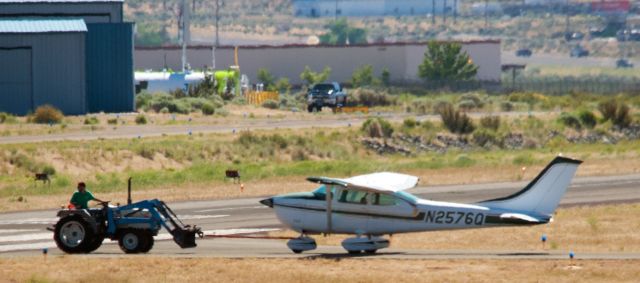 Cessna Skylane (N2576Q) - Someone needed a tow toward El Aero across the 09 threshold at Carson City