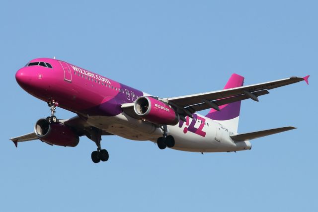 Airbus A320 (HA-LPN) - 04/08/2021:  Flight from Bucharest (OTP), Romania, on final to runway 12.