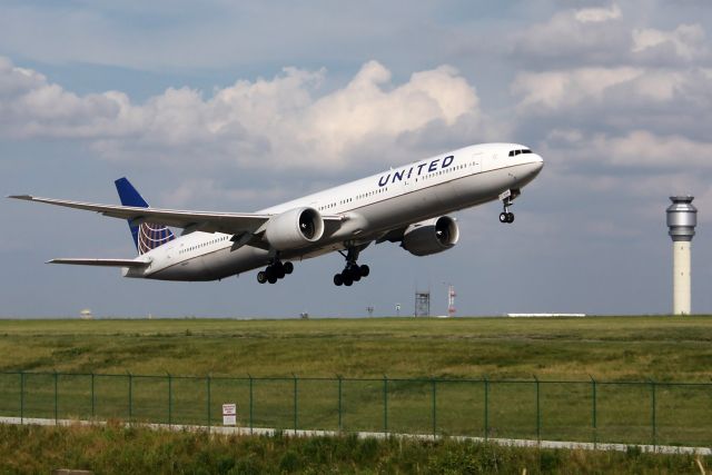 BOEING 777-300 (N2644U) - United 777 departing off of 24R to EWR after diverting here because of weather 