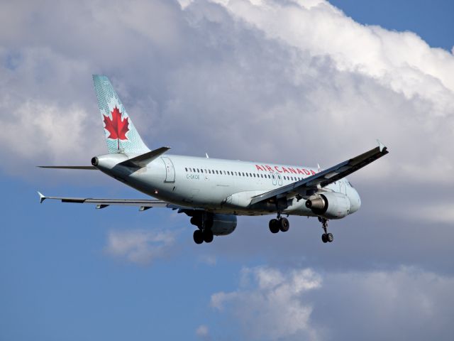 Airbus A320 (C-GKOE) - Out spotting during a beautiful if windy day.