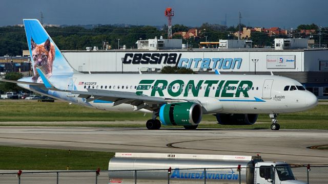 Airbus A320neo (N330FR) - 13R arrival.