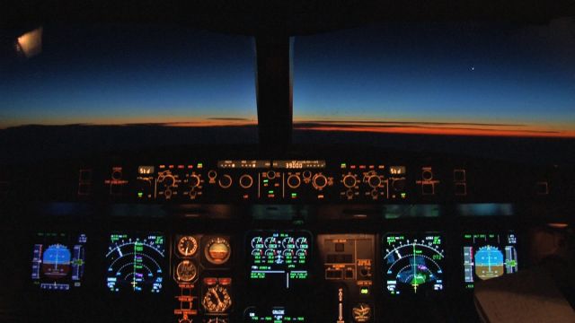 Airbus A340-300 (AP-EDF) - Sunrise in the cockpit of Airblues Airbus A340-300 en route to Islamabad from Manchester