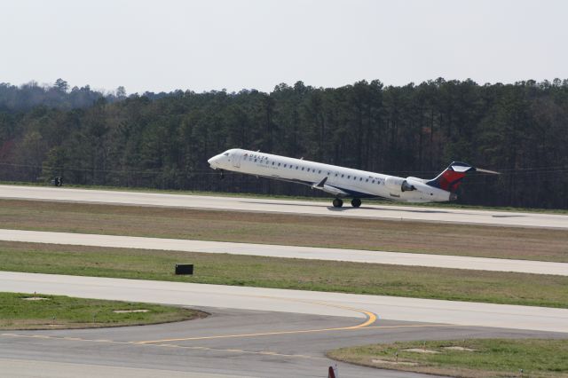 Canadair Regional Jet CRJ-900 (N914XJ) - N914XJ rotating on runway 23R