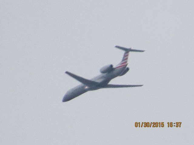 Embraer ERJ-145 (N699AE) - Envoy Air flight 3326 from DFW to Joplin Missouri at 9,000 feet over Baxter Springs Kansas.