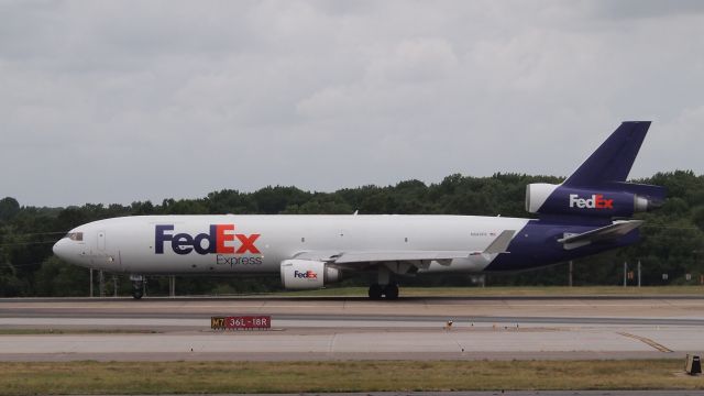 Boeing MD-11 (N585FE) - "Katherine" on takeoff roll down 18R