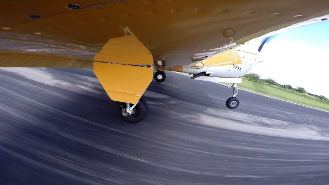 Beechcraft Bonanza (33) (N9590Y) - Landing with Erik Johnston Photography on board with his awesome camera set-up. 