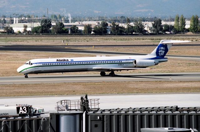 McDonnell Douglas MD-80 (N785JA) - KSJC - early 1990s atop Terminal A at San Jose - Alaska MD-80 series ex Jet America  just landed from Seattle and on taxi to terminal C