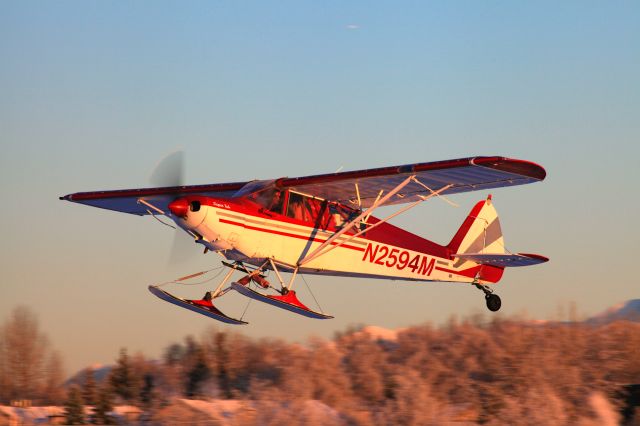 Piper PA-12 Super Cruiser (N2594M) - Landing on the lake to the west near sunset in late December.