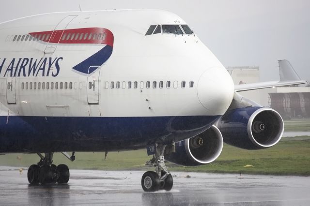 Boeing 747-400 (G-CIVN) - Rain in station!