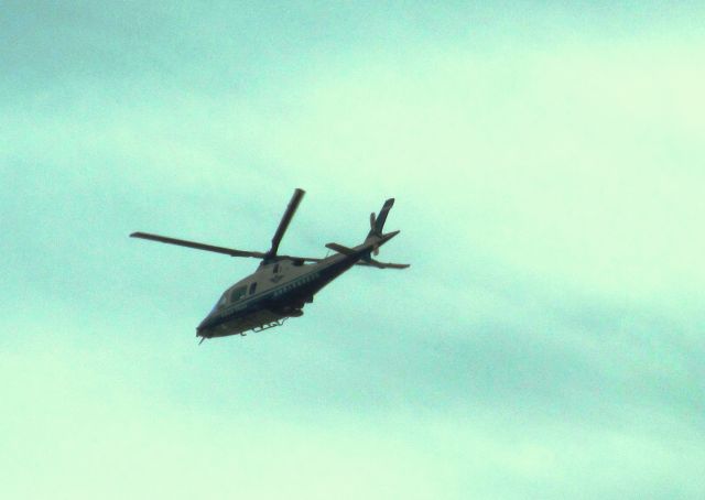 — — - Beijing Police helicopter on patrol...