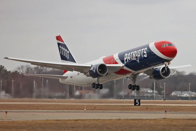 BOEING 767-300 (N36NE) - "36 November Echo heavy" departing runway 5 at T.F. Green, headed to Super Bowl LII