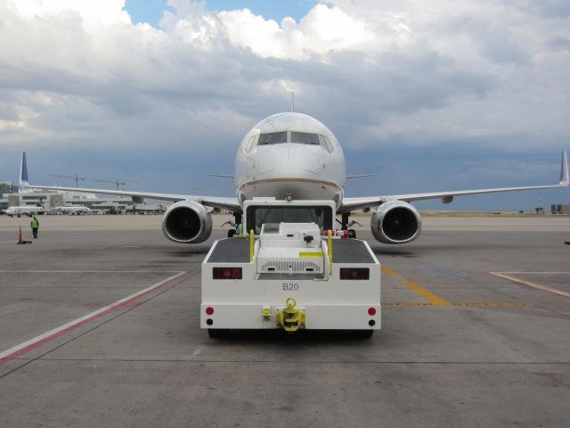 Boeing 737-800 — - Snapped this shot after my crew  and i were done loading and in the middle of pushback.
