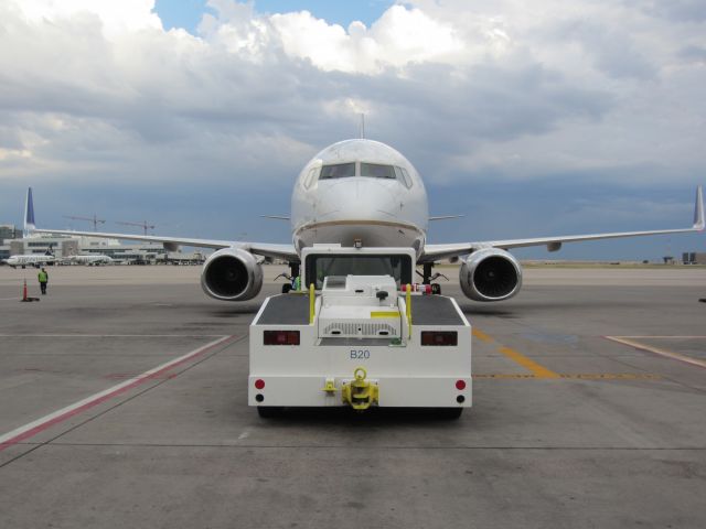 Boeing 737-800 — - Snapped this shot after my crew  and i were done loading and in the middle of pushback.