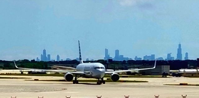 — — - Arriving in Chicago.