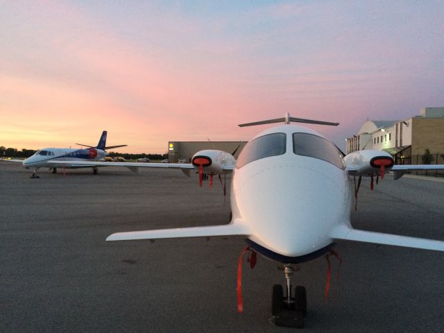 Piaggio P.180 Avanti (N145GS) - Sunset and some bizjets