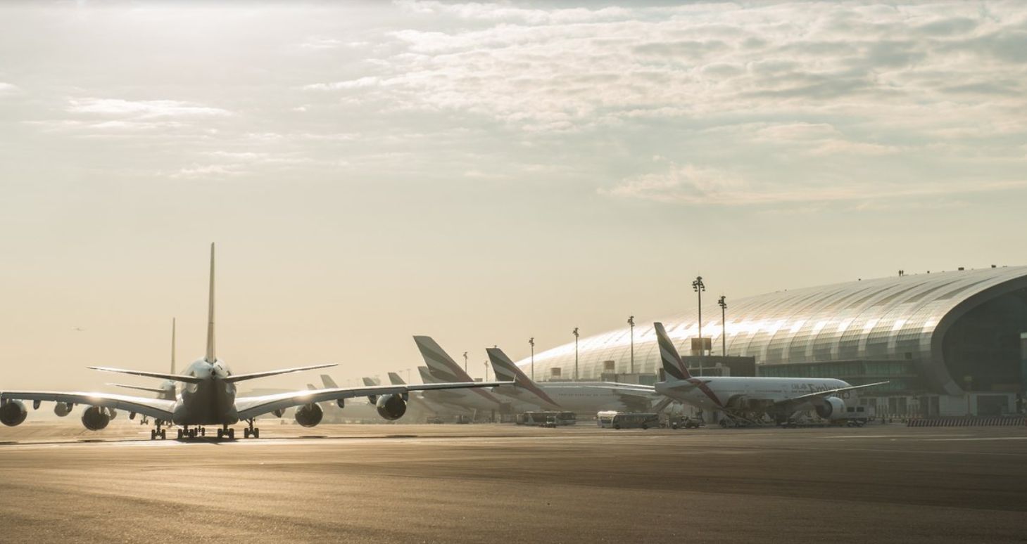 BOEING 777-300ER (A6-EQA) - View of Terminal 3 preparing to taxi behind two other Airbus A380s