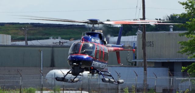 Bell 407 (N77NY) - LINDEN AIRPORT-LINDEN, NEW JERSEY, USA-JULY 13, 2022: A news helicopter from one of the local New York City television stations is seen by RF at approximately 1524 hrs.