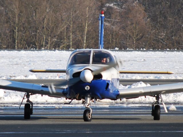 Piper Saratoga (N38305) - Preparing to taxi to runway 02 at Concord Regional Airport - 3/2/09