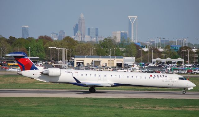 Canadair Regional Jet CRJ-700 (N928XJ) - Rolling 18C - 4/4/10