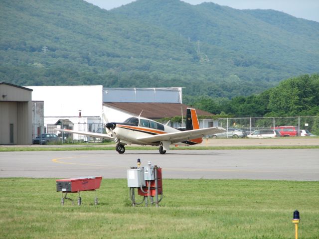 Mooney M-20 (N5617Q) - Touchdown at the 2009 WRAP Pancake breakfast.