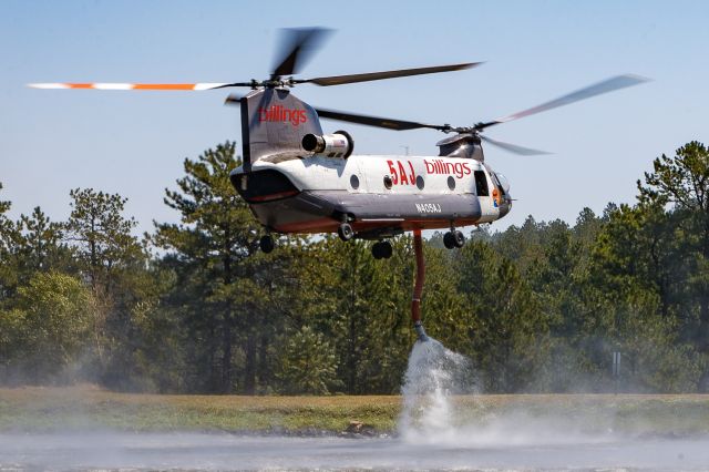 Boeing CH-47 Chinook (N405AJ) - N405AJ pausing for a drink at Cedar Springs Reservoir while working the Alexander Mountain Fire near Drake, Colorado 8/3/24.