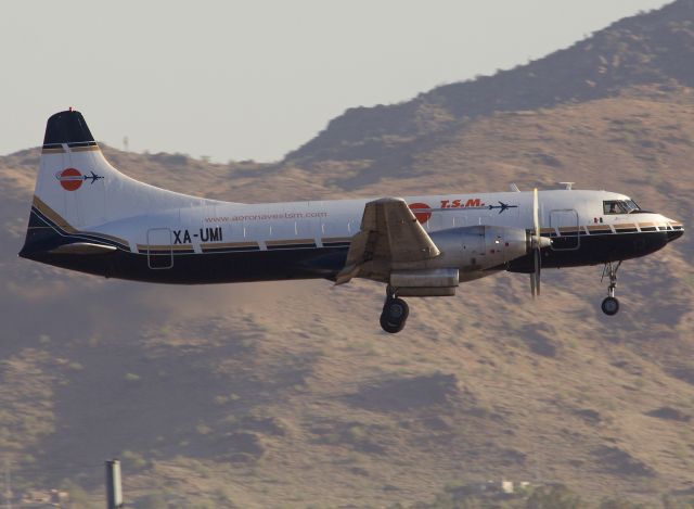 CONVAIR CV-580 (XA-UMI) - This Convair 340 was originally delivered to Braniff Airways in 1953. Amazing to see it still in regularly scheduled service with Aeronaves TSM. This bird was retrofitted with Rolls Royce Dart Turboprops and is now classified as a CV-640. Thanks to George Maidens for pointing this out in the comments!! A true treat to see as I had never photographed an active airborne former Braniff aircraft! (Please view in "Full" for best image quality)