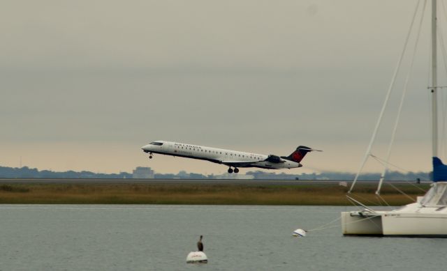 Canadair Regional Jet CRJ-900 (C-FJQZ) - Air Canada Jazz flight landing in Boston, October 2021