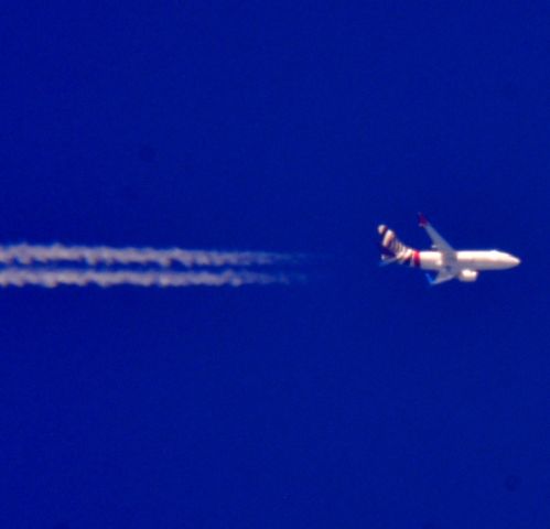 — — -  any idea who this 737-7CJ belongs to? Captured this image as they were well over the lake erie by cleveland at 39,000 east bound. It looks like they originated from Dallas I tracked the to Kennybunkport  Me. then flew over Atlantic and down the coast. All info was NA. Nice paint job.