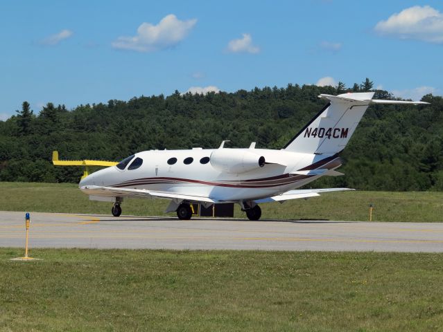 Cessna Citation Mustang (N404CM) - Taxiing out for departure runway 22.