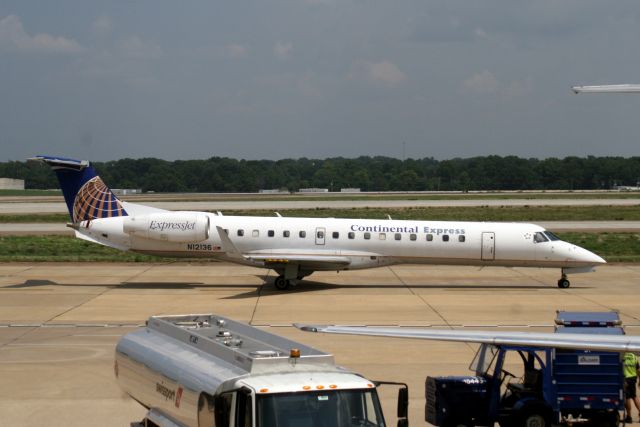 Embraer ERJ-145 (N12136) - Taxiing to depart R36C on 02-Aug-10.