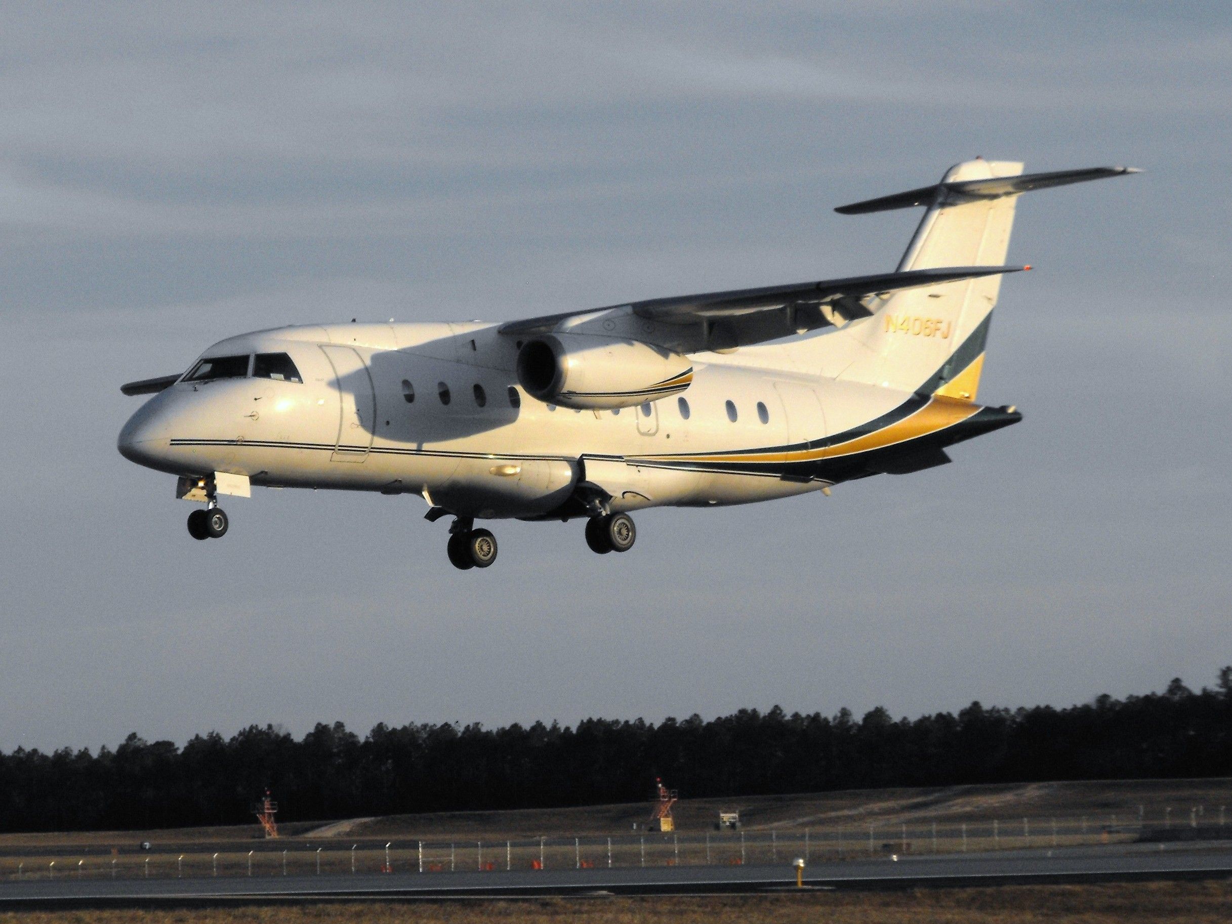 Fairchild Dornier 328JET (N406FJ) - Ultimate 6 just prior to touchdown on RWY 36