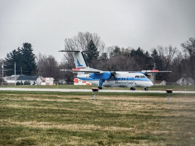 de Havilland Dash 8-300 (N837EX) - Powell avenue loop and an American eagle piedmont powered dash 8 Q100 in the pdt heritage livery 