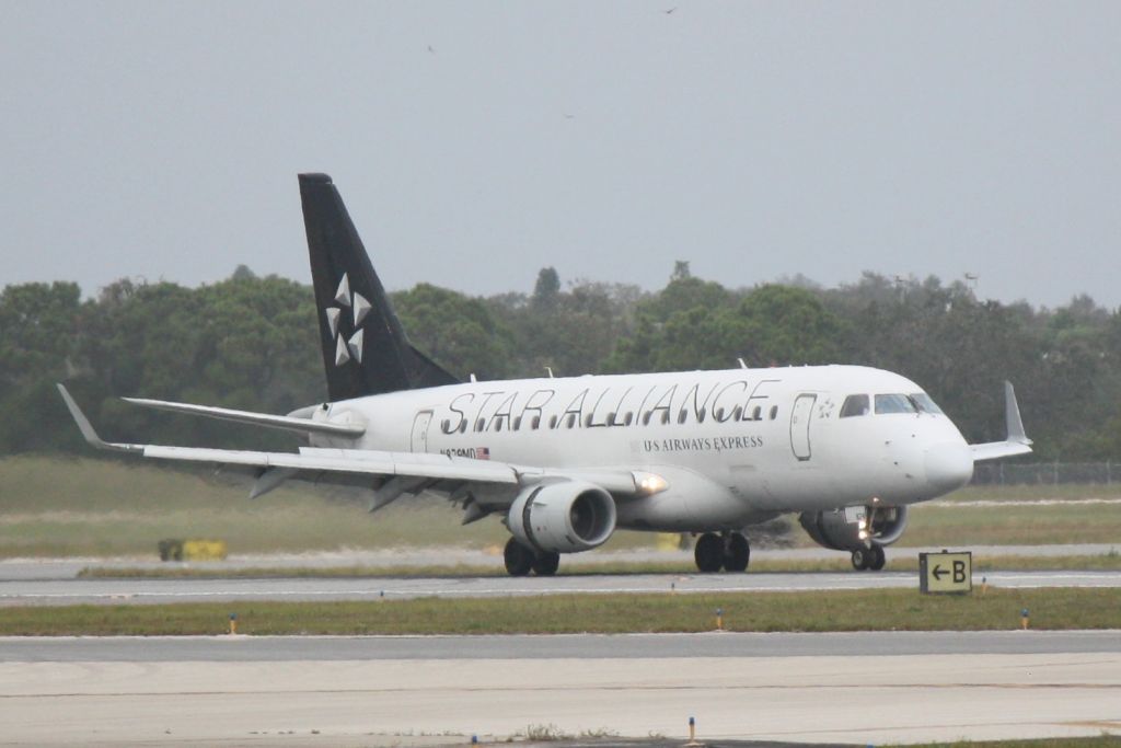 Embraer 170/175 (N829MD) - Republic Airlines/US Airways Express Flight 3399 (N829MD) arrives on Runway 14 at Sarasota-Bradenton International Airport following a flight from Reagan National Airport